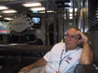 Jack Roush relaxes inside Mark Martin's hauler.